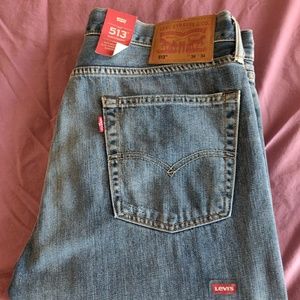 Levis 513 slim straight distressed jeans